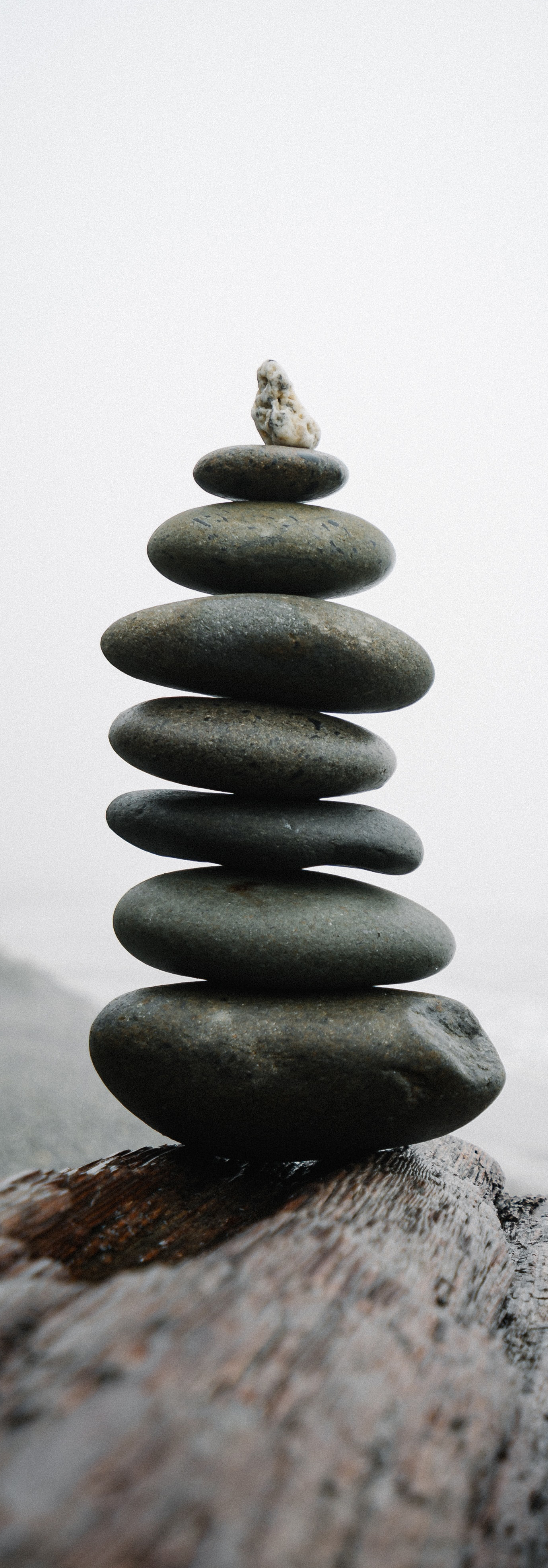 Smooth, round rocks balanced carefully on top of each other